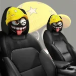 2pcs，a comical expression car headrest cover wearing a yellow star-woven hat, easy to install and clean, suitable for long trips